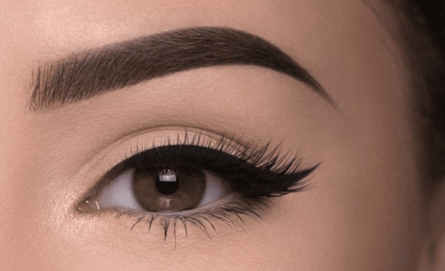 Close view of a softly shaped semi-permanent eyebrow
